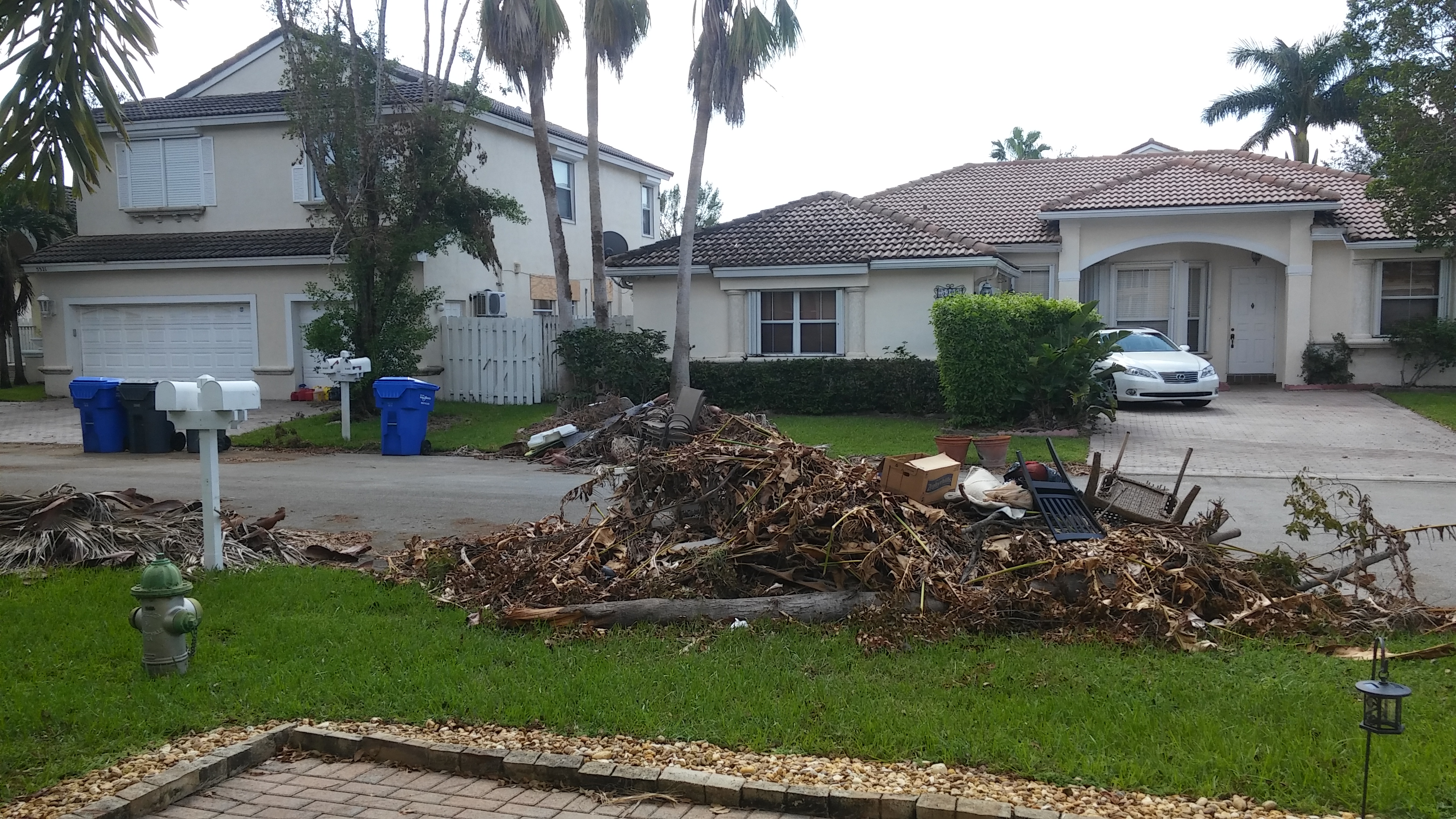 Pile of debris in front of home